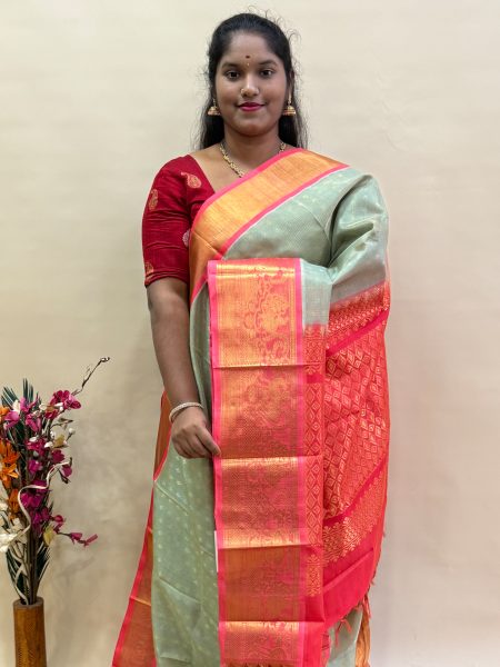 Silk Cotton Korvai Vairaoosi in Pastel Green And Orange With Traditional Border