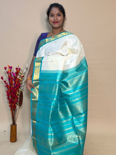 Silk Cotton Korvai Buttas In Half White  And Teal With Traditional Border