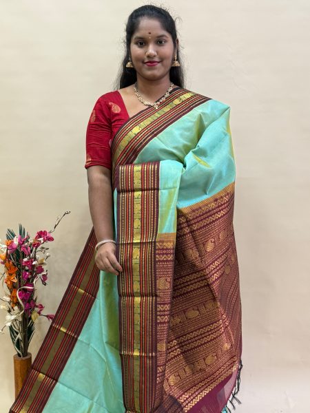 Silk Cotton Korvai in Dual Shaded Teal And Arakku With Traditional Border