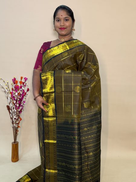 Mayil Chakram Silk Cotton in Dark Sampanga and Black With Traditional Border