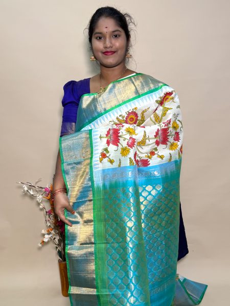Kuppadam Silk Cotton Kalamkari Prints in White And Teal With Traditional Border