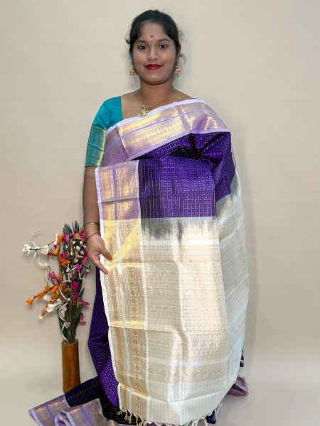Traditional Silk Cotton Lakshadeepam Saree In Magentha And Half White With Traditional Border