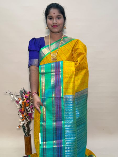 Kalakshetra Kuppadam Silk Cotton Lakshadeepam in Mango Yellow And Teal With Traditional Border