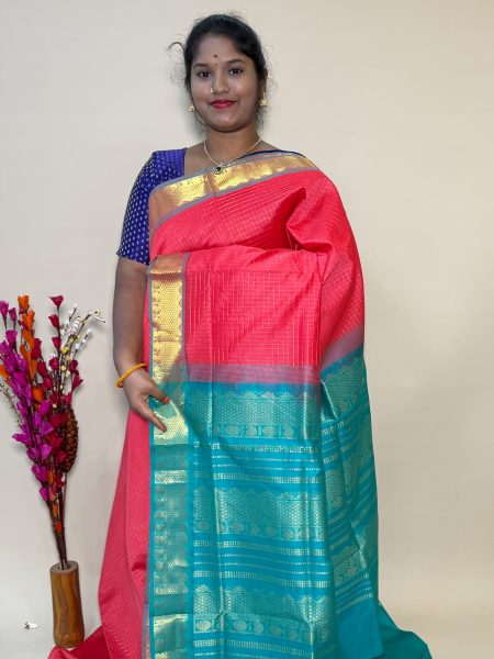 Semi Silk Cotton Kattam In Peach And Teal With Traditional Border