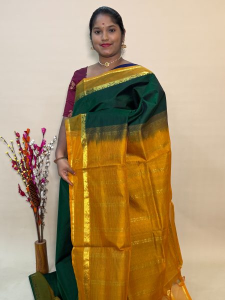 Simple Silk Cotton Saree in Green And Mustard With Traditional Border