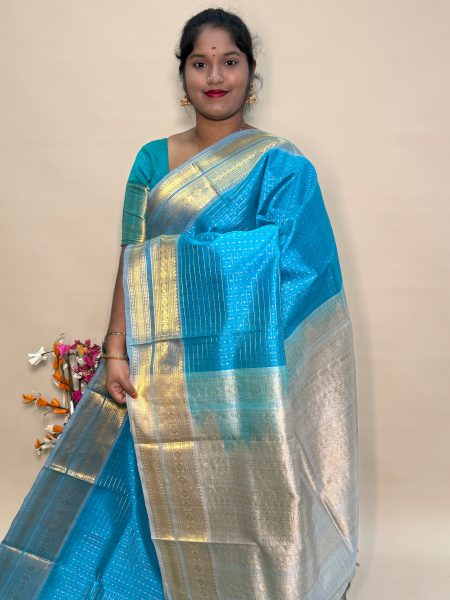 Traditional Silk Cotton Lakshadeepam Saree In CS Blue And Grey With Traditional Border