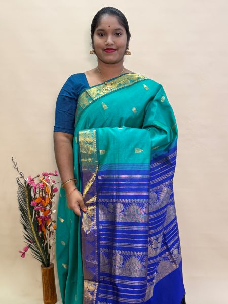 Semi Silk Cotton Buttas In Teal Green And Violet With Traditional Border