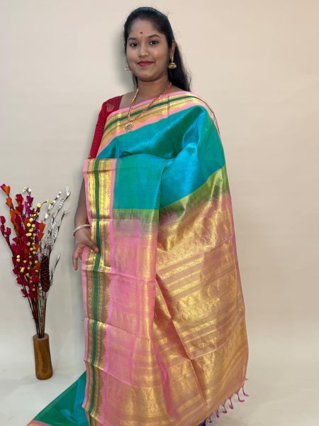 Silk Cotton Korvai in Dual shaded Teal And Peach With Traditional Border