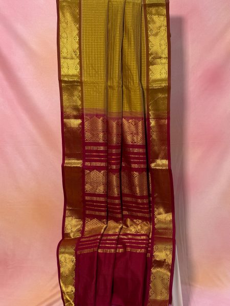 Madisar Semi Silk Cotton Checked Saree In Light Sampanga And Maroon With Traditional Border