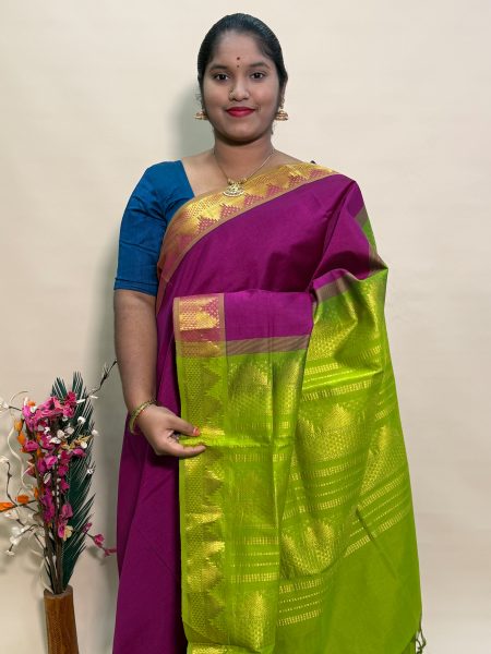 Semi Silk Cotton Plain In Magentha And Olive Green With Traditional Border