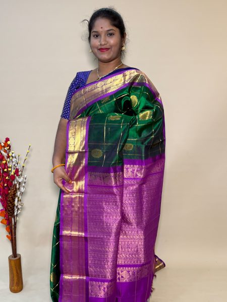 Mayil Chakram Silk Cotton in Green and Magentha With Traditional Border