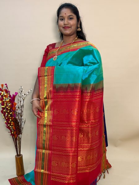 Silk Cotton Korvai in Dual shaded Teal And Red With Traditional Border