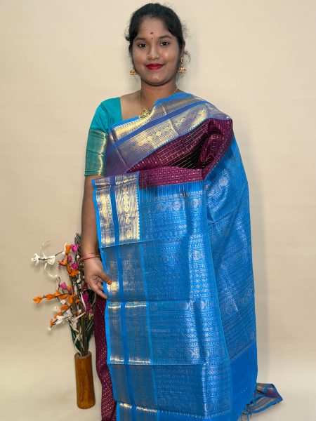 Traditional Silk Cotton Lakshadeepam Saree In Wine And CS Blue With Traditional Border