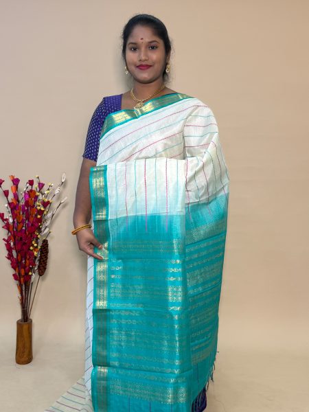 Silk Cotton Kuppadam Veldhari In Half White And Teal With Traditional Border