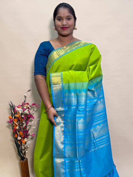 Semi Silk Cotton Plain In Parrot Green And CS Blue With Traditional Border