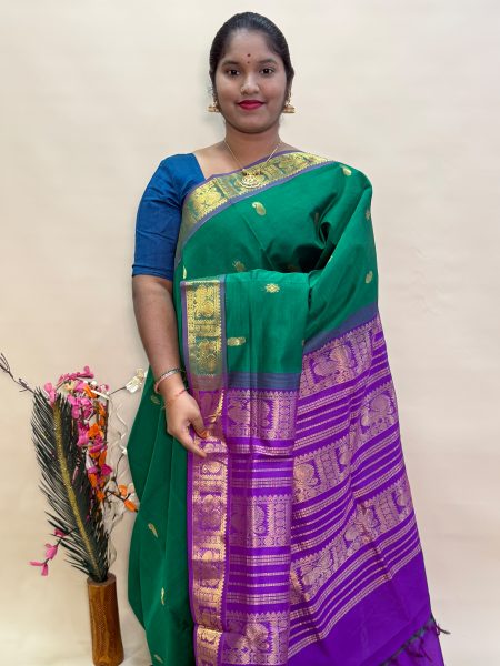 Semi Silk Cotton Buttas In Green And Magentha With Traditional Border