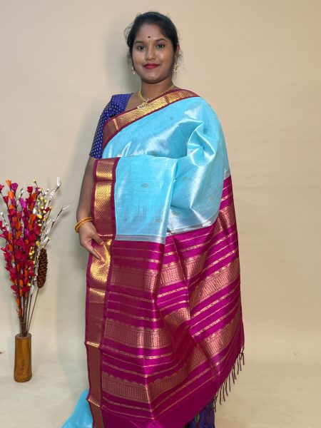 Silk Cotton Korvai Buttas In Powder Blue And Vadamalli With Traditional Border