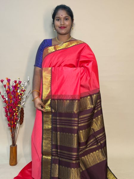 Semi Silk Cotton Plain In Peach Orange And Brown With Traditional Border