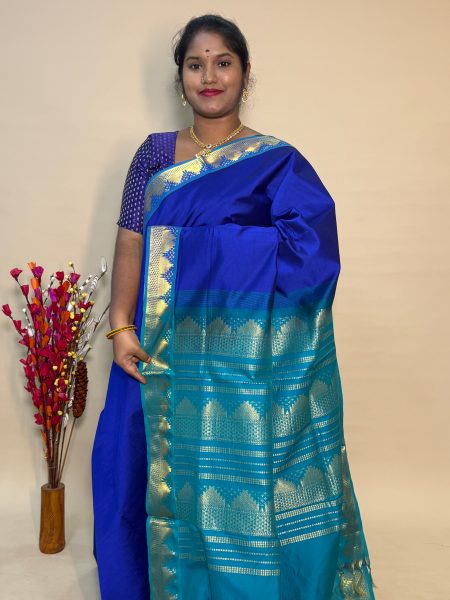 Semi Silk Cotton Plain In Royal Blue And Peacock Green With Traditional Border