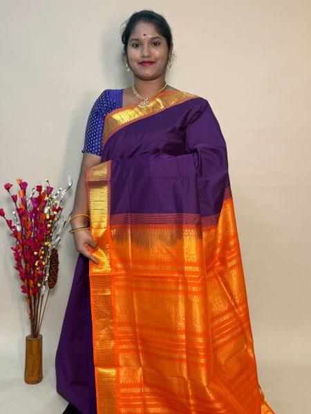 Semi Silk Cotton Plain In Dark Magentha And Orange With Traditional Border