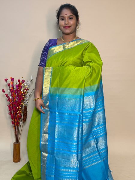 Semi Silk Cotton Plain In Olive Green And CS Blue With Traditional Border