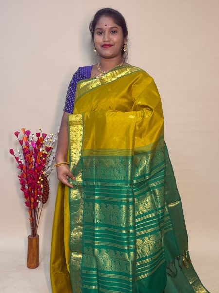 Semi Silk Cotton Buttas In Sampanga And Green With Traditional Border