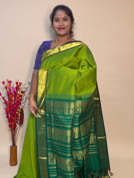 Semi Silk Cotton Vairaoosi In Parrot Green And Green With Traditional Border