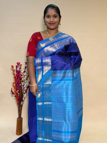 Traditional Silk Cotton Lakshadeepam In Violet and CS Blue With Traditional Border