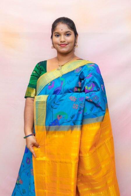 Semi Silk Cotton Kalamkari Prints In Peacock Green And Mustard With Traditional Border