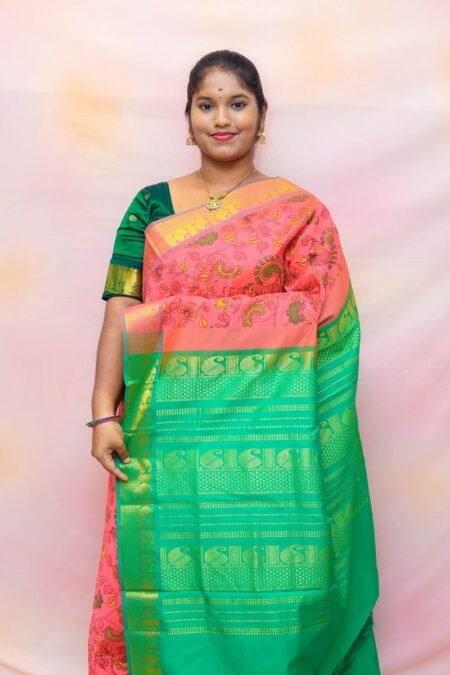 Semi Silk Cotton Kalamkari Prints In Orange And Green With Traditional Border