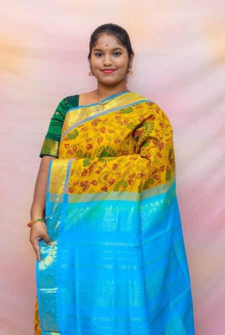 Semi Silk Cotton Kalamkari Prints In Olive Mustard And CS Blue With Traditional Border