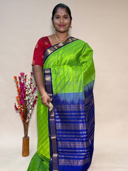 Kuppadam Silk Cotton Veldhari In Parrot Green And Violet With Traditional Border