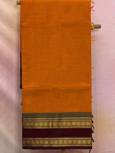 Kanchi Cotton Plain Saree In Sunset Orange With Traditional Border