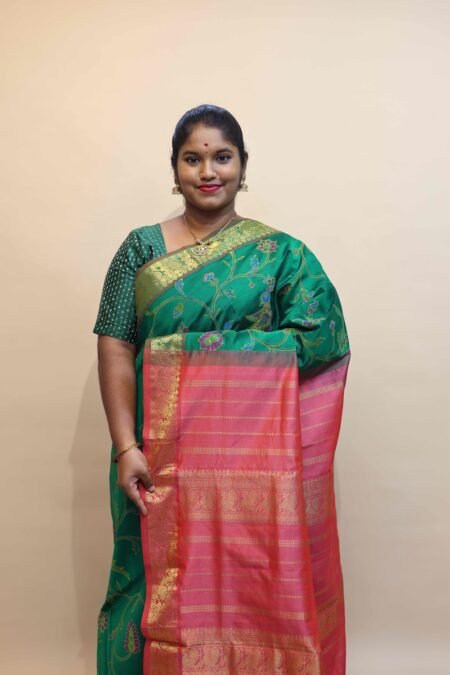 Semi Silk Cotton Kalamkari Prints In Green And Copper Pink With Traditional Border