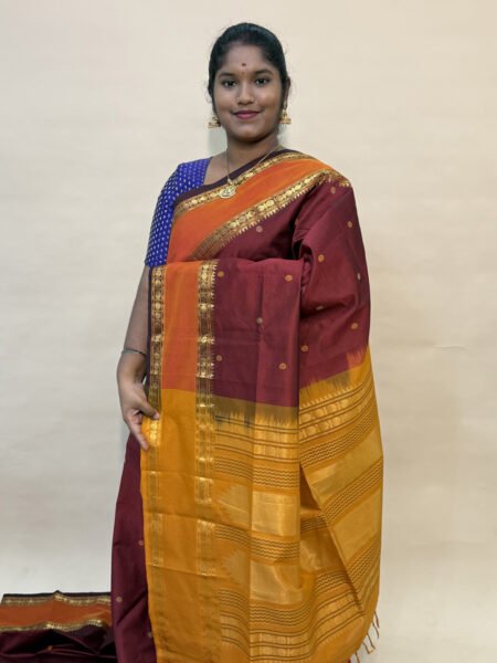 Kalkshetra Semi Silk Cotton Saree In Maroon And Mustard With Traditional Border