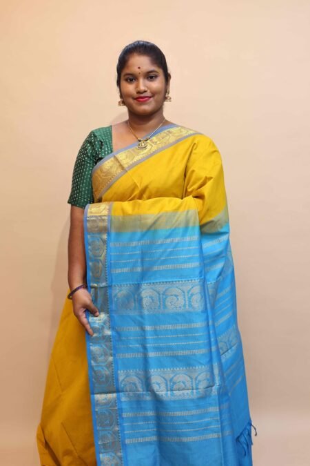 Semi Silk Cotton Saree In Sampanga And CS Blue With Traditional Border