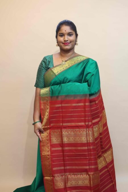 Semi Silk Cotton Saree In Green And Maroon With Traditional Border