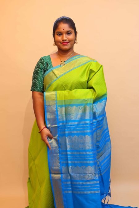 Semi Silk Cotton Zari Kattam In Olive Green And CS Blue With Traditional Border