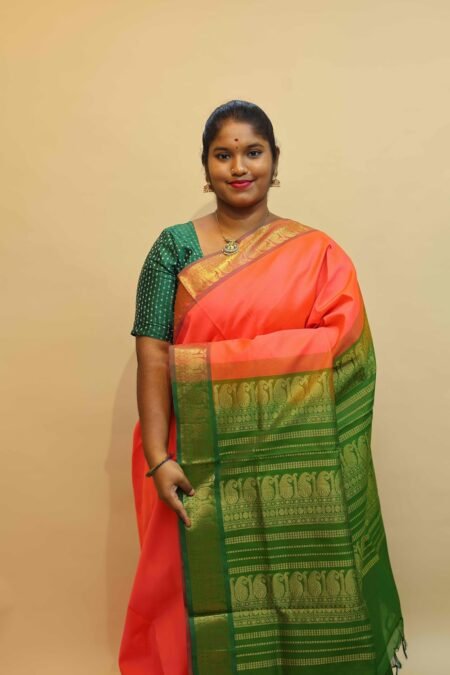 Semi Silk Cotton Vairaoosi in Peach Orange And Dark Olive Green With Traditional Border